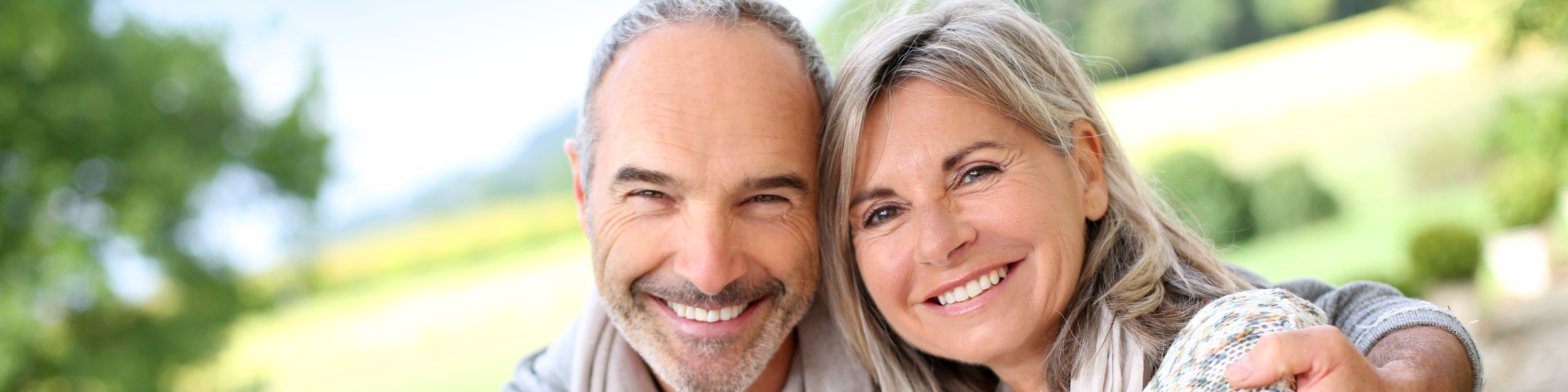 couple, man, woman, senior, male, 50s, fifties, mature, handsome, attractive, countryside, portrait, closeup, outdoors, casual, smile, smiling, people, serenity, peaceful, love, husband, wife, married, happy, serene, fall, autumn, scarf, embracing, hugging, tenderness, sitting, relaxed, nature, season, garden, cheerful, joyful, affection, affectionate, romantic, romance Fotolia_56515946_L.jpg